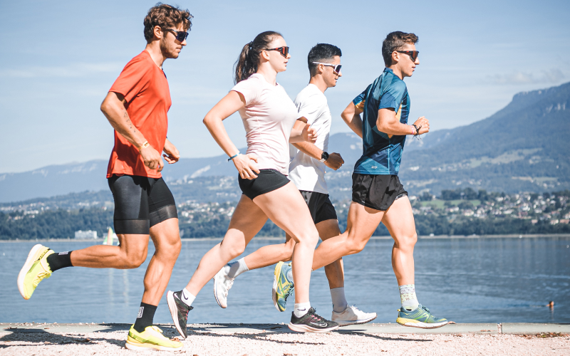 Runner training on a track to boost running endurance with four proven training upgrades.