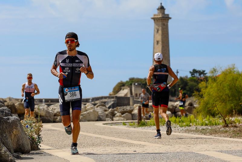 Runner training for first triathlon, preparing to swim, cycle, and run with confidence.