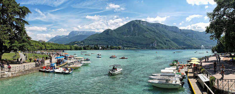 Runner training in Annecy on lakefront paths and scenic trail routes near Lake Annecy.