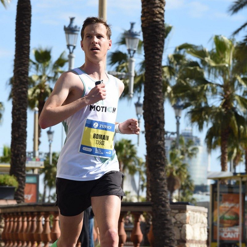 Runner following a smart training plan for the Barcelona Marathon, aiming to break 2:35.