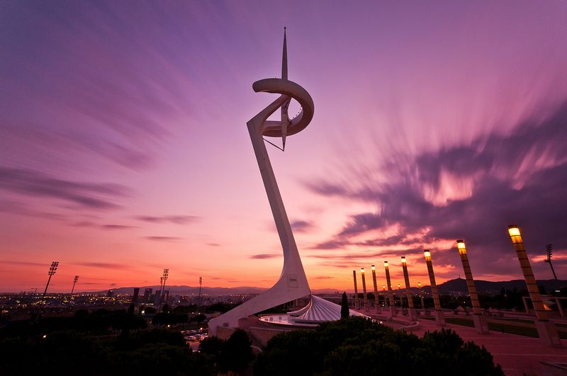Runner on the Montjuïc Olympic Park loop in Barcelona, a scenic city running route.