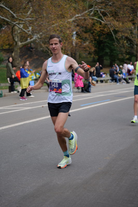 NYC Marathon 2023 runners racing through New York City, best race-day photos from RunMotion Coach.