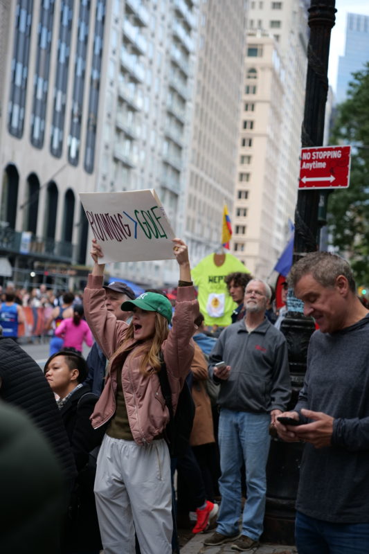 Race-day runners at the 2023 NYC Marathon, featured in RunMotion Coach’s best photo highlights.