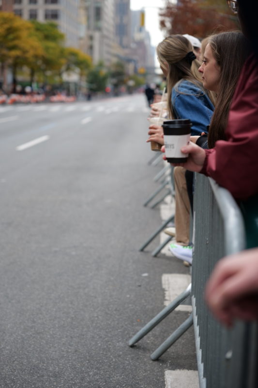 Race-day photos from NYC Marathon 2023 showing runners in action coached by RunMotion Coach.