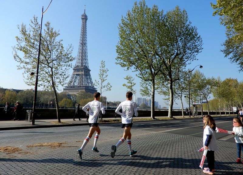 Runner following a Paris Marathon training plan, pacing smarter to run strong and finish fast.