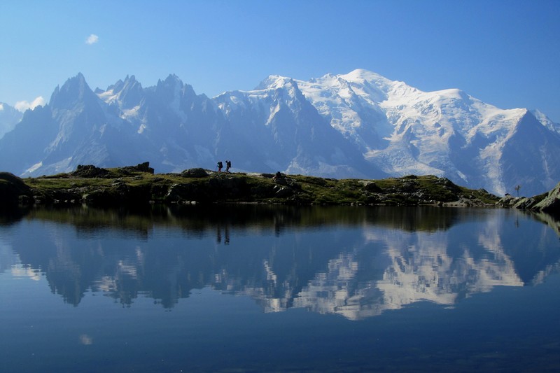 Trail runner on Tour du Mont Blanc Day 4, tackling a 40 km mountain route.