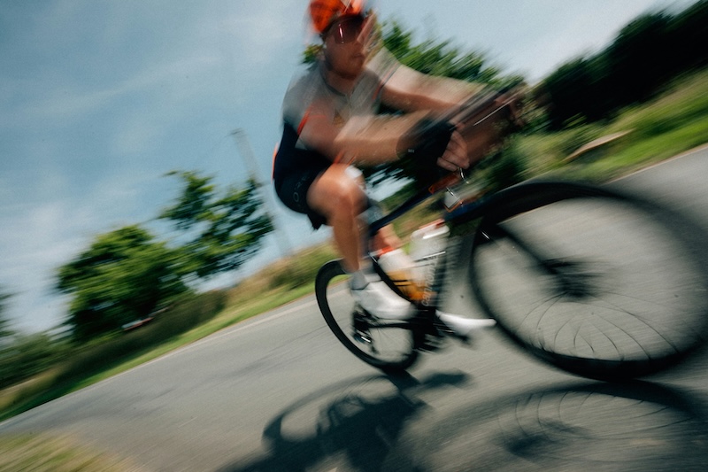 Triathlon taper week checklist showing swimming, cycling, and running training plan 7 days before race day.