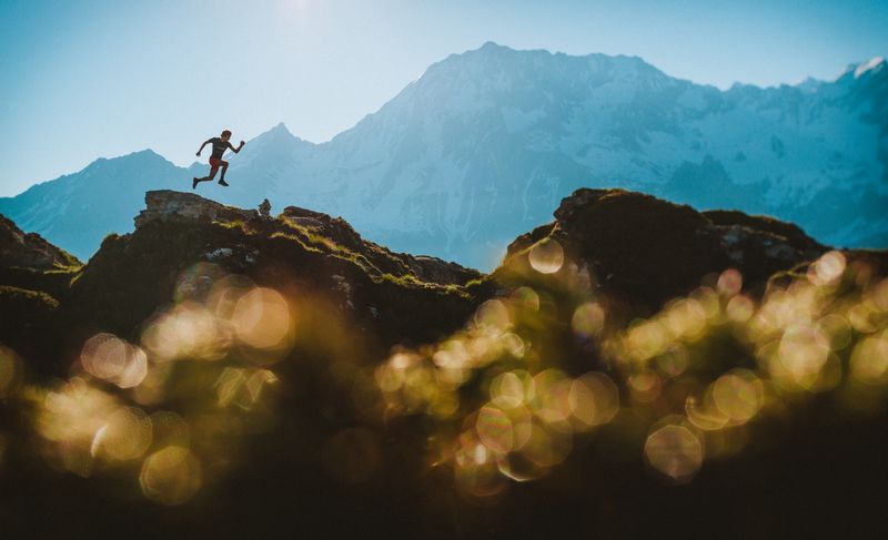 Runner training for UTMB Mont-Blanc ultra trail, focusing on endurance climbs and race preparation.