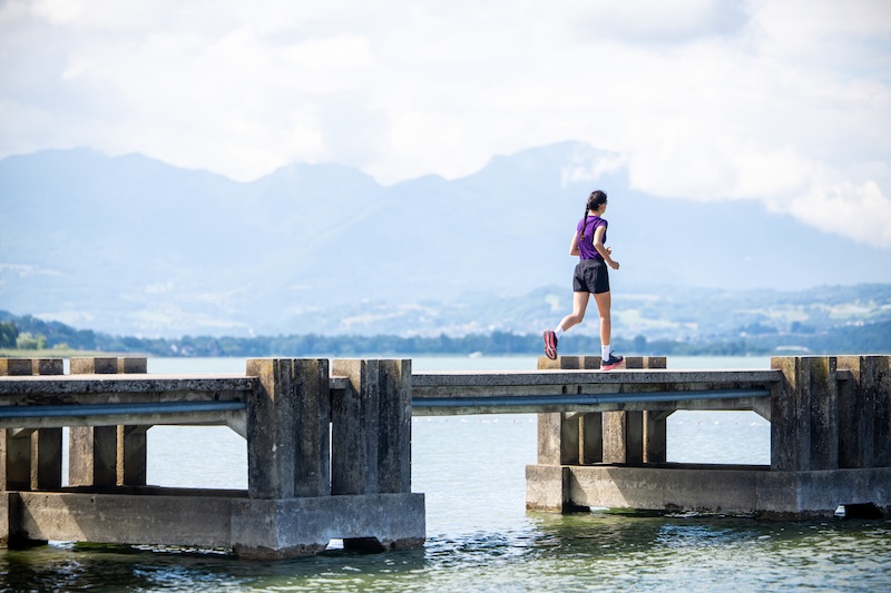 Triathlete doing zone 2 swim, bike, and run workout to build aerobic endurance.