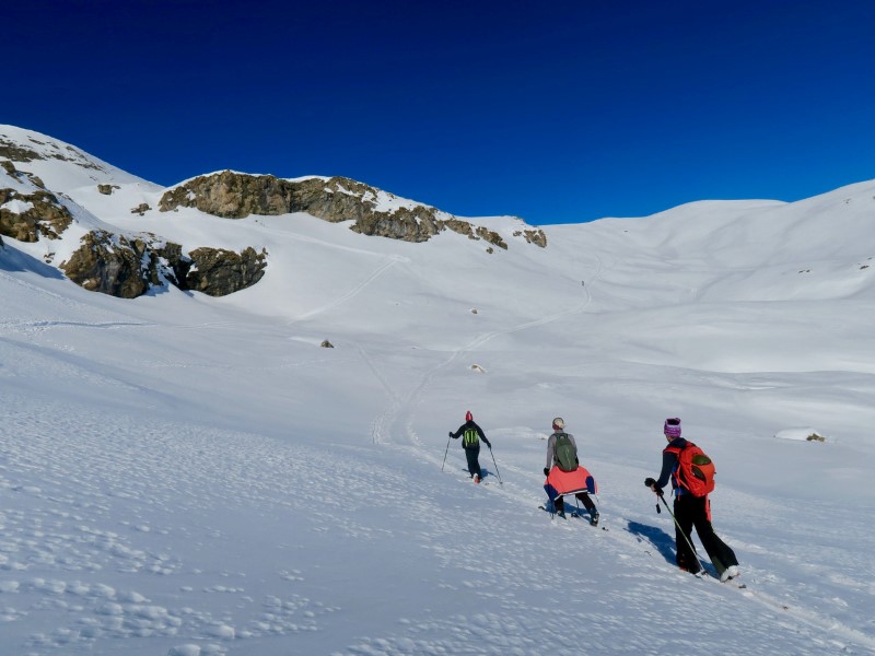 Trail runner enjoying first ski touring outings for winter endurance training and mountain fitness