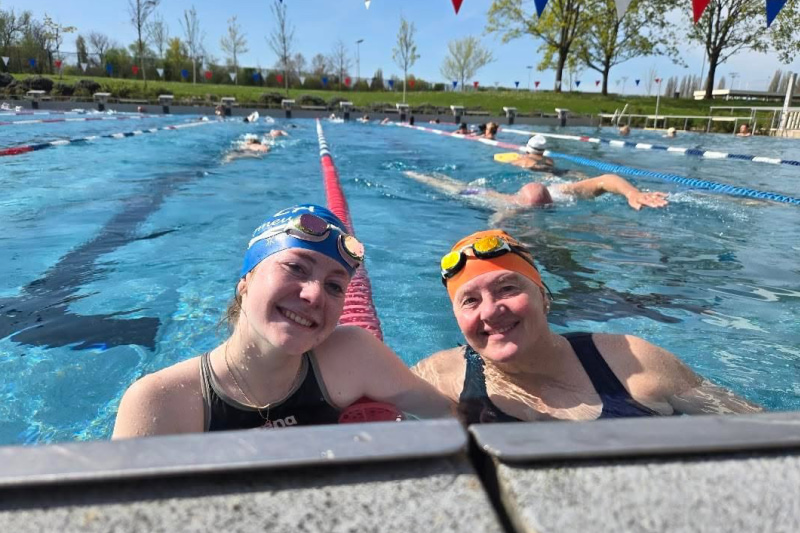 Sacha celebrating after first triathlon training success at AlpsMan, highlighting endurance, swimming, cycling, and running achievement.