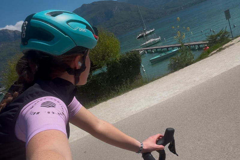 Female triathlete training for her first triathlon, combining swimming, cycling, and running before race day.