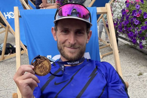 Julien finishing the MCC at UTMB, celebrating his inspiring trail running comeback from injury.