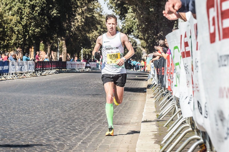 Romain Adam racing the Rome Marathon, nearing his personal best with a strong 2:35 finish