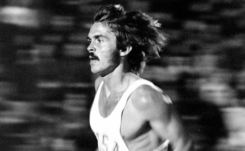 Steve Prefontaine running on the track, representing the legendary athlete who transformed distance running.