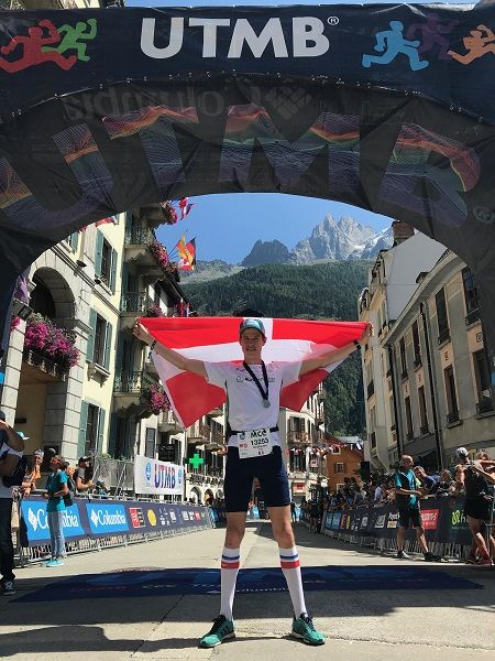 Trail runner preparing race strategy one month before the UTMB Mont-Blanc ultramarathon.